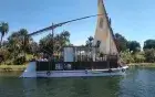 Dendera by lotus boat — traditional Egyptian wooden vessel sailing from Luxor to Dendera